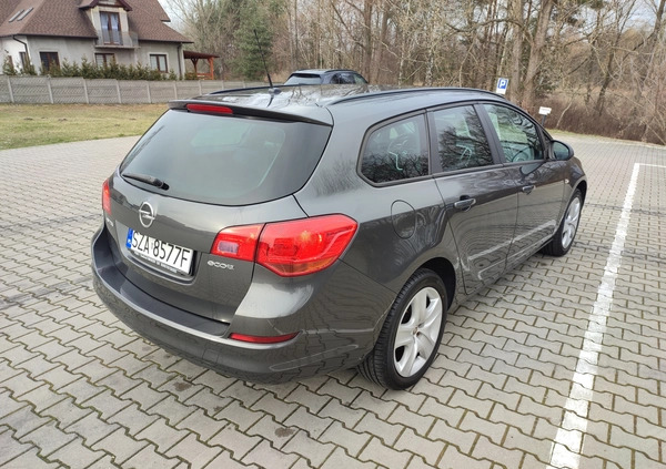 Opel Astra cena 24999 przebieg: 118000, rok produkcji 2011 z Puszczykowo małe 191
